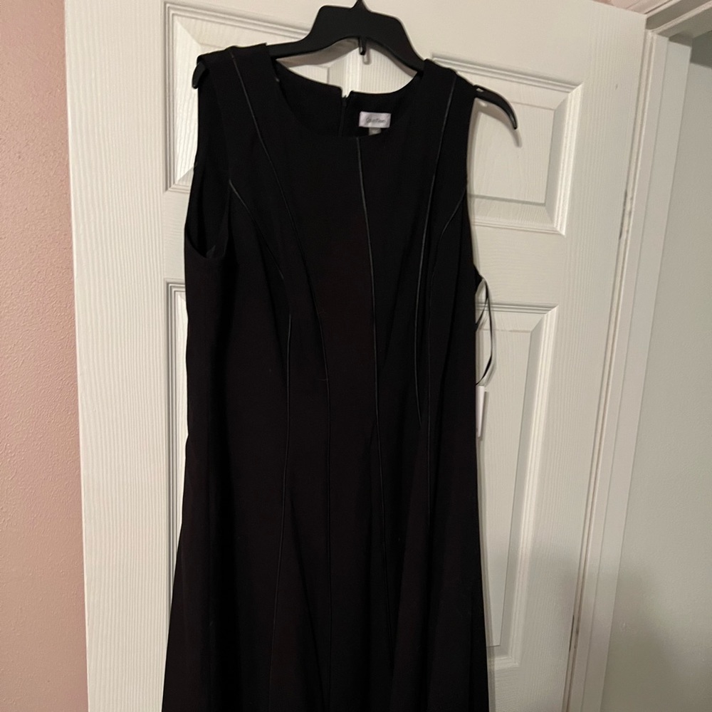 Brand new Calvin Klein black dress. Size 14 women’.